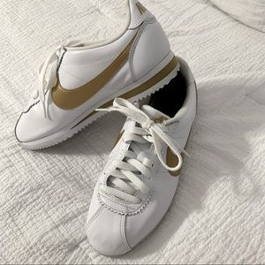 Gold and white Nike Cortez, women’s size 7.5